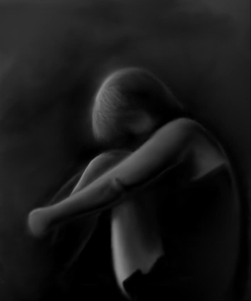 mujer deprimida en las sombras